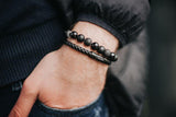 Bracelet en pierres de lave et perle en argent massif et cuir tressé