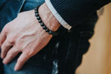 Bracelet en pierres de lave et perle en argent massif