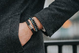 Bracelet en pierres de lave et perle en argent massif et cuir